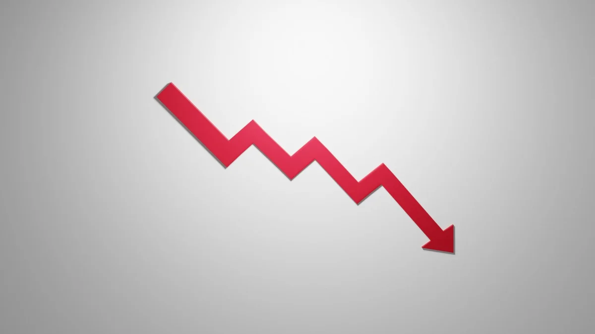 A jagged red line with an arrow on the end trends downward.